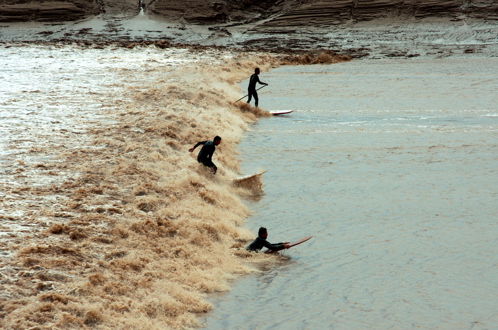 SUP Surfing the Petitcodiac River Tidal Bore Paddle Surf